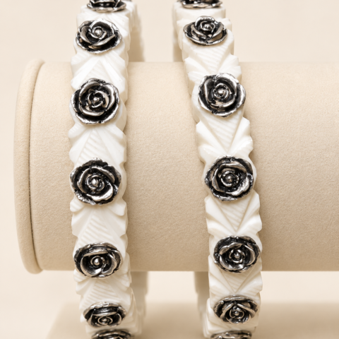 white carved bangles with silver roses